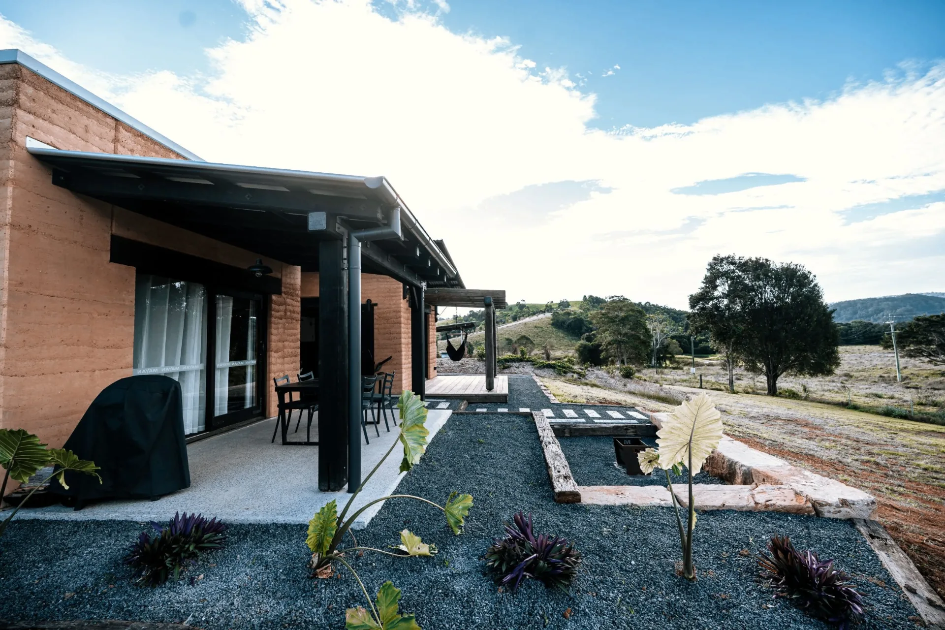 Villa exterior opening onto the Noosa hinterland