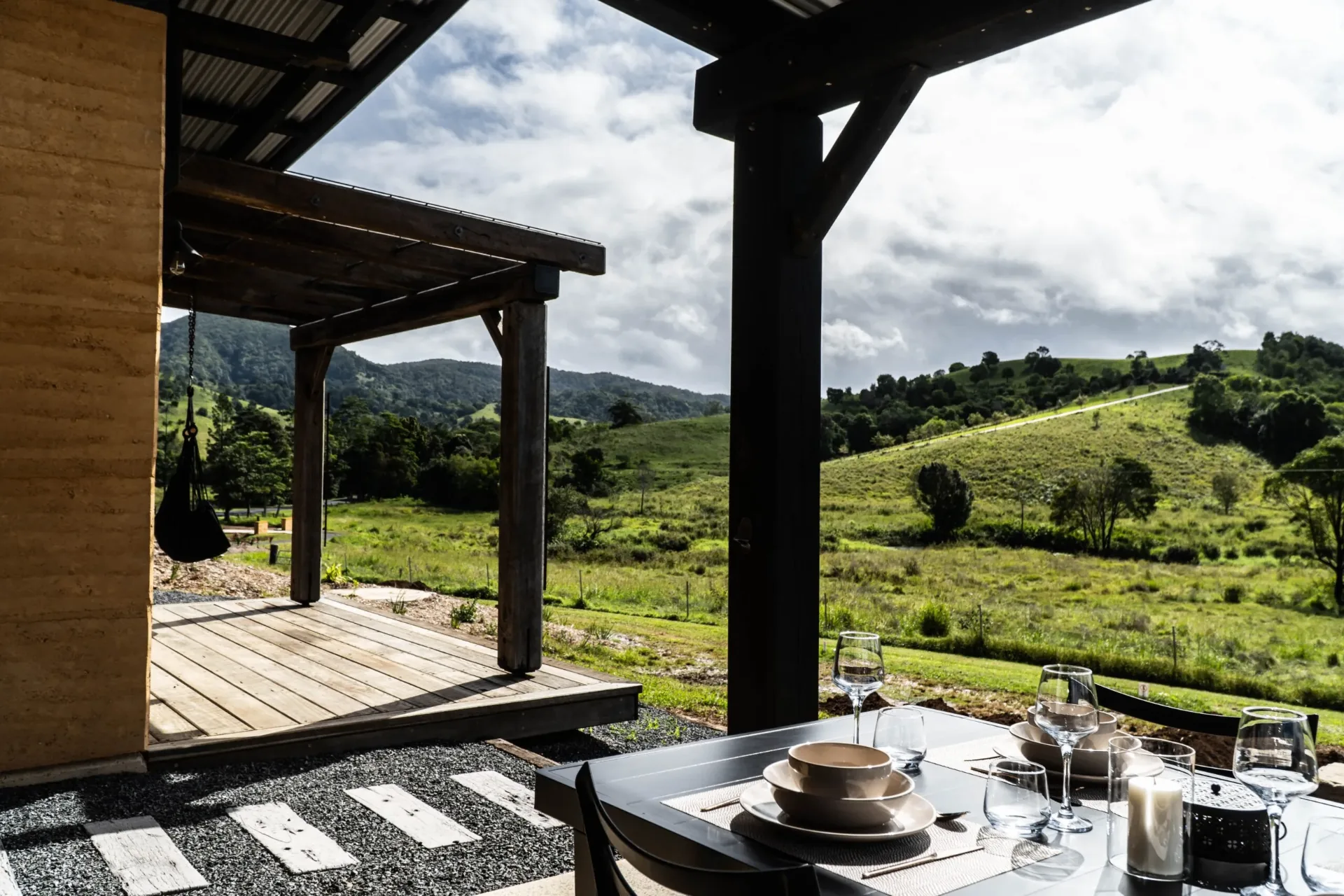 Dining on the deck with hinterland views