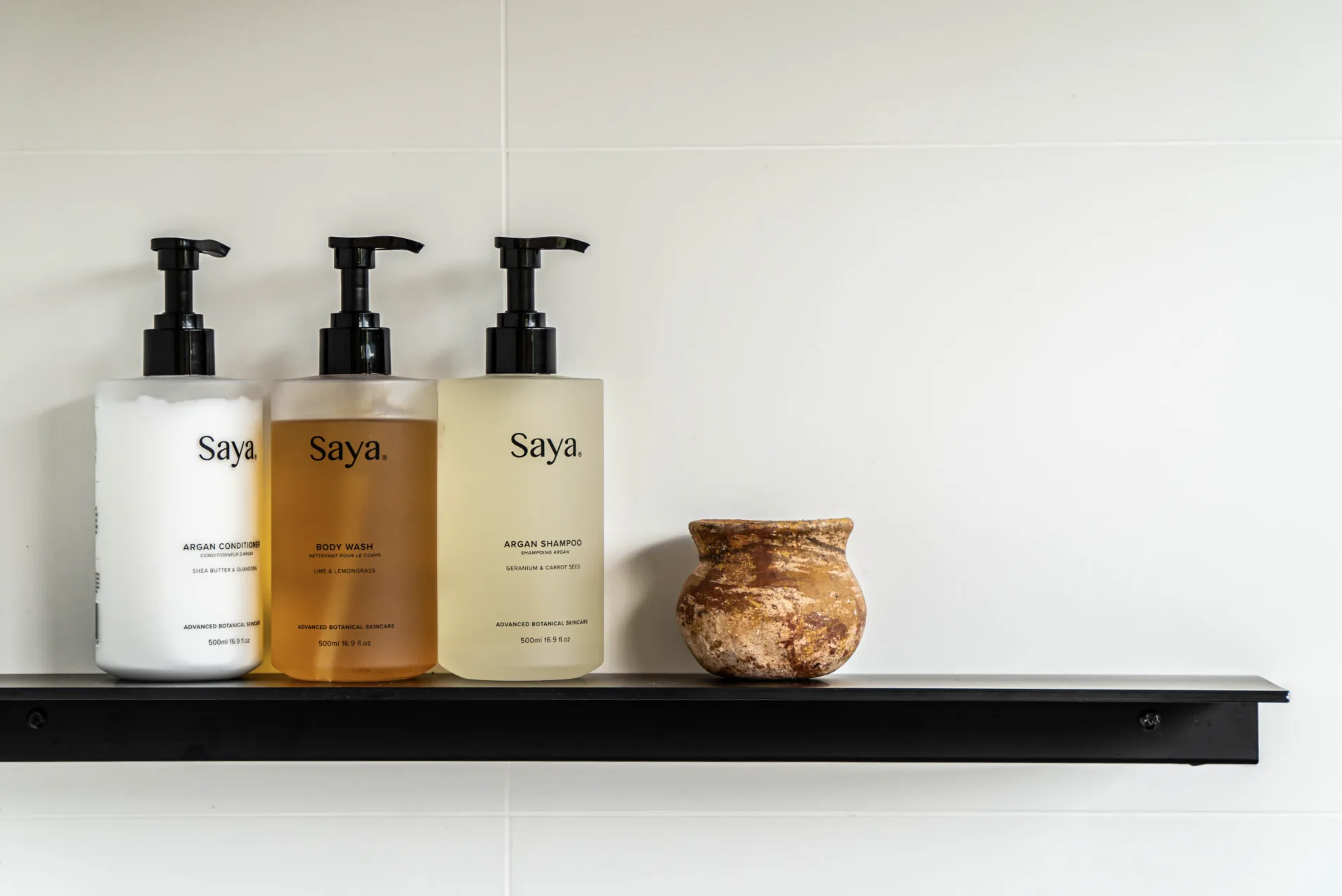 Saya bath amenities on a shelf